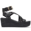 Sandalias cuña Querol con tachuelas y tiras cruzadas, ajustables al tobillo