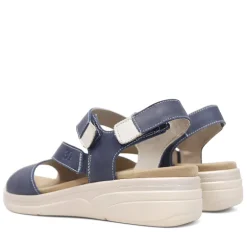 Sandalias cuña Treintas azules de piel con tira cruzada en el empeine y cierre de velcro