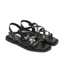 Sandalias planas Porronet victoria negras de piel con tiras cruzadas y tachuelas