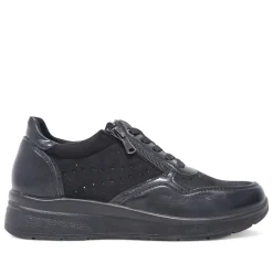 Zapatillas urban Amarpies negros con cremallera lateral y brillantes