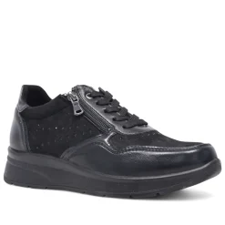 Zapatillas urban Amarpies negros con cremallera lateral y brillantes
