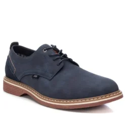 Zapatos sport Xti azules con ribete marrón trasero