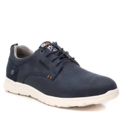 Zapatos sport Xti azules con tirador trasero y detalle azul marino